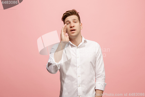 Image of Isolated on pink young casual man shouting at studio