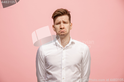 Image of Beautiful bored man isolated on pink background