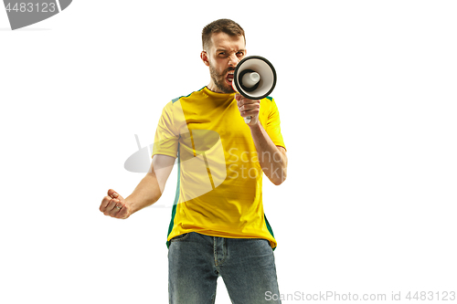 Image of Brazilian fan celebrating on white background