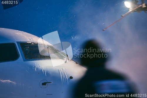 Image of Deicing of airplane