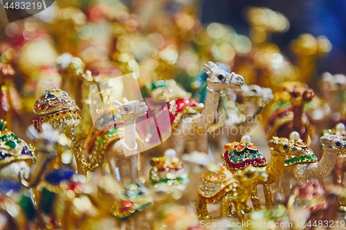 Image of Souvenirs of camels at souq in Muscat