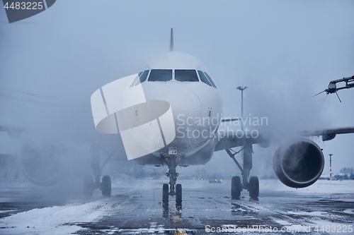 Image of Deicing of airplane