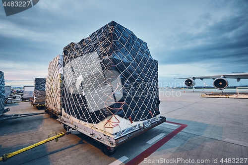 Image of Loading cargo to airplane