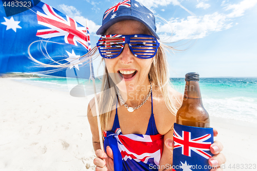 Image of Happy female Australia  day beach celebration