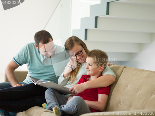 Image of family with little boy enjoys in the modern living room