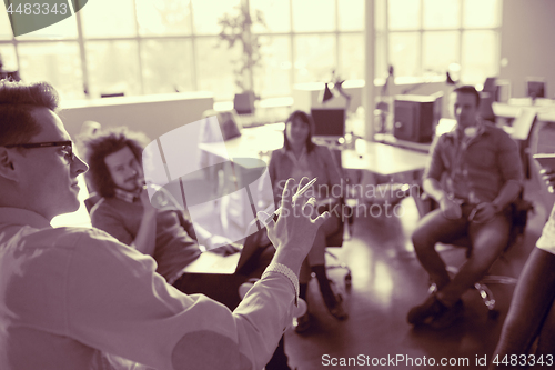 Image of Young Business Team At A Meeting at modern office building