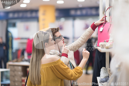 Image of best friend shopping in big mall