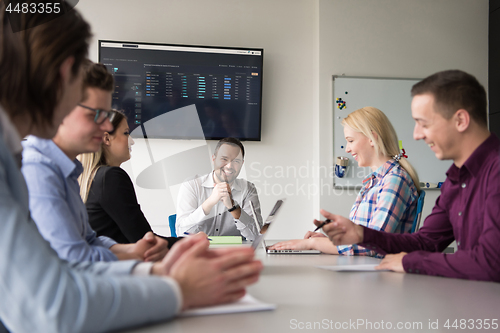 Image of Business Team At A Meeting at modern office building