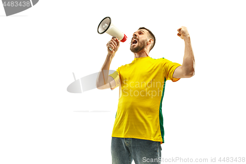 Image of Brazilian fan celebrating on white background