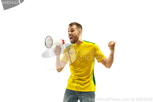 Image of Brazilian fan celebrating on white background