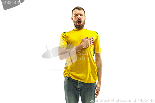 Image of Brazilian fan celebrating on white background