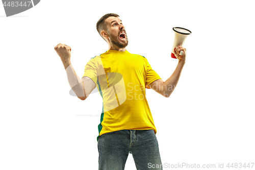 Image of Brazilian fan celebrating on white background