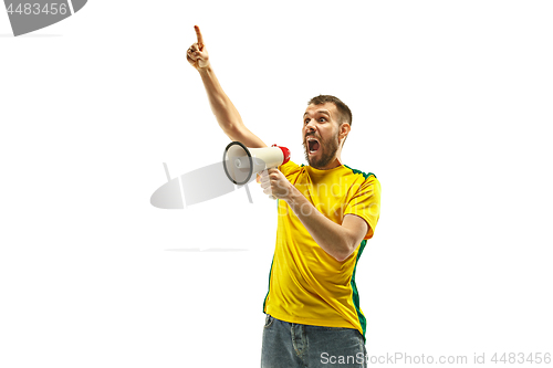 Image of Brazilian fan celebrating on white background