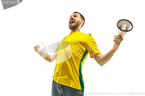 Image of Brazilian fan celebrating on white background
