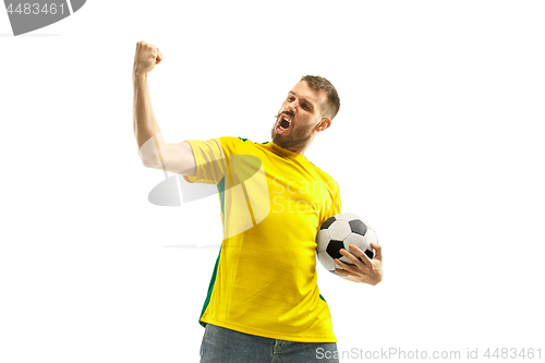 Image of Brazilian fan celebrating on white background