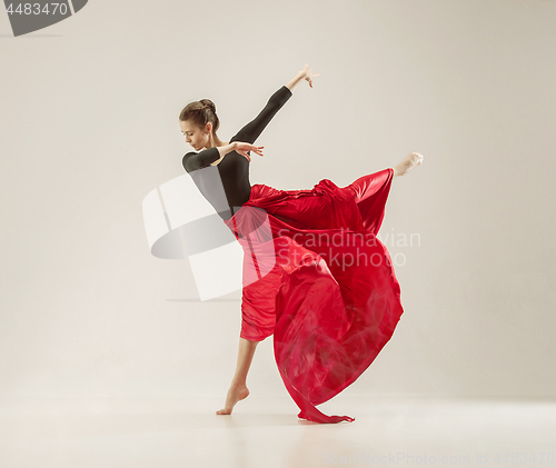 Image of Modern ballet dancer dancing in full body on white studio background.