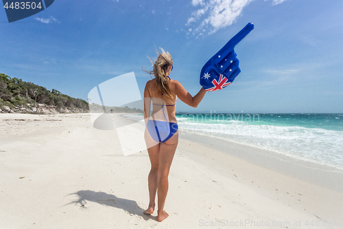 Image of Australian culture or holiday concept Bikini woman with pointing finger inflatable