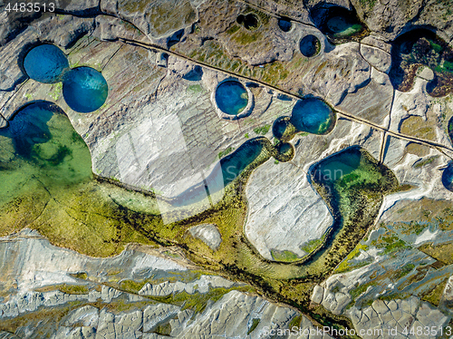 Image of Rock pools on exposed coastal rock shelf platform