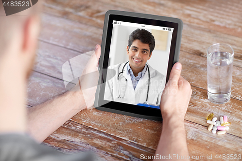 Image of patient having video chat with doctor on tablet pc