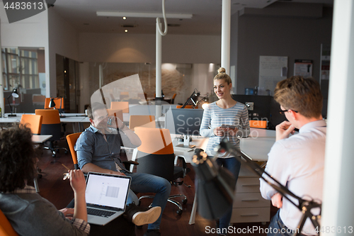 Image of Young Business Team At A Meeting at modern office building