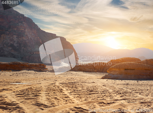 Image of Rocks in sand deser