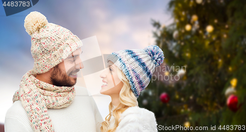 Image of happy couple over christmas tree