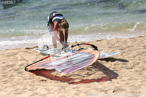 Image of On shore preparations for windsurfing