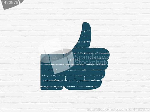 Image of Social media concept: Thumb Up on wall background