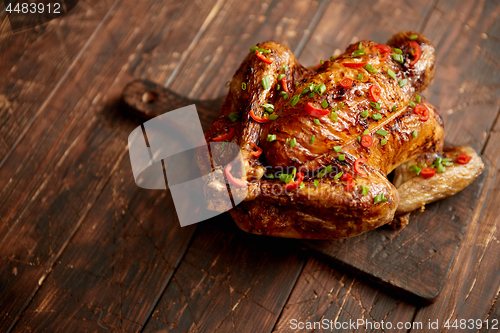 Image of Homemade roasted spicy chicken with chilli and chive