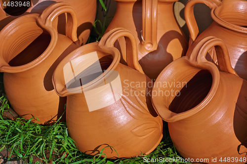 Image of Clay Pitchers on the Grass