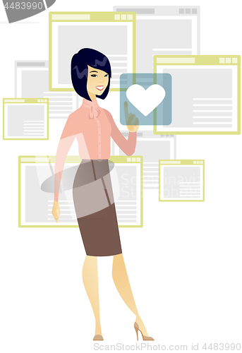 Image of Business woman pressing web button with heart.