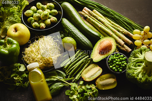 Image of Green healthy food composition with avocado, broccoli, apple, smoothie...