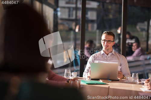 Image of Business Team At A Meeting at modern office building