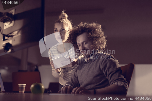 Image of young designers in the night office