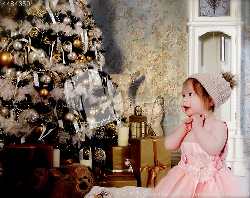 Image of Little Girl Waiting Christmas Gifts