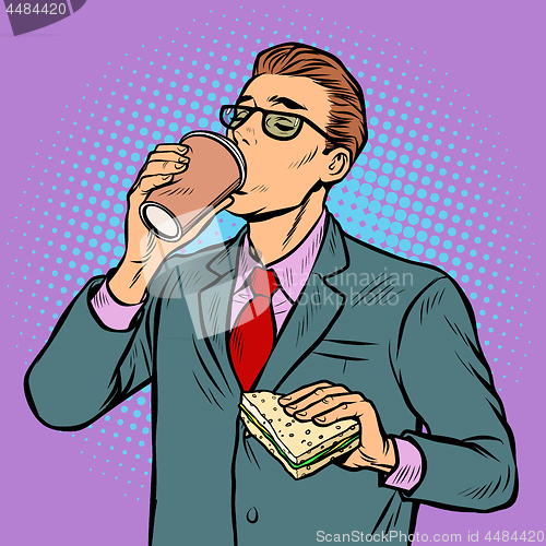 Image of man drinking coffee and eating sandwich