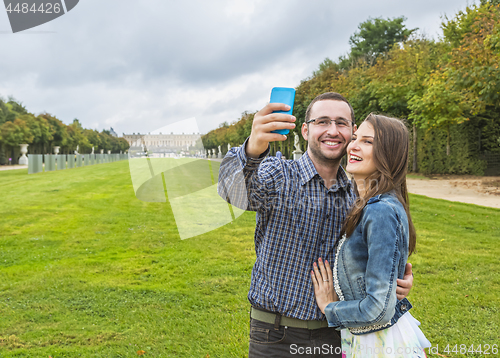 Image of Coupe Taking a Selfie