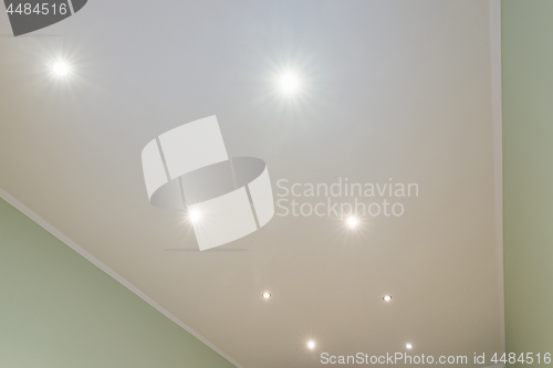 Image of Ceiling in the room with spotlights installed and turned on