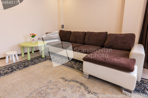 Image of Interior living room, large sofa table and stool