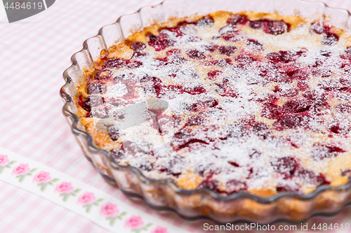 Image of Cherry clafoutis. Traditional Frensch milk pie with cherry