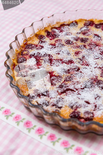 Image of Cherry clafoutis. Traditional Frensch milk pie with cherry