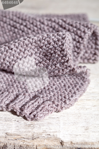 Image of knitted brown scarf