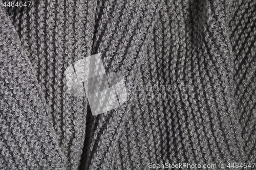 Image of knitted grey scarf 