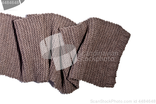 Image of knitted brown wool scarf 