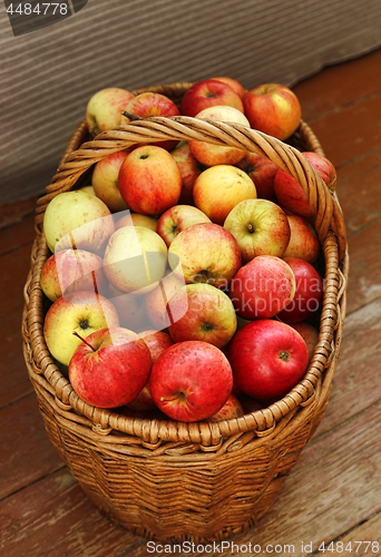 Image of Bright tasty ripe apples in a basket