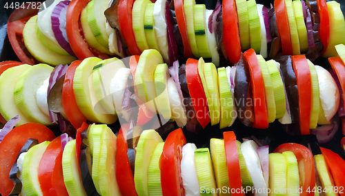 Image of Cut vegetables cooked for baking, food background