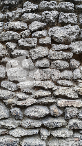 Image of Rough wall lined with large cobblestones