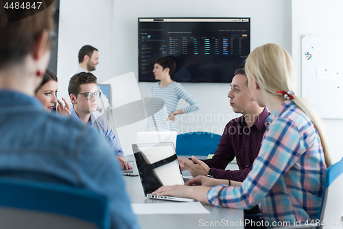 Image of Business Team At A Meeting at modern office building