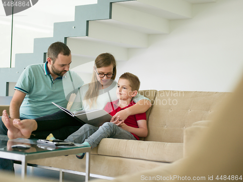 Image of family with little boy enjoys in the modern living room