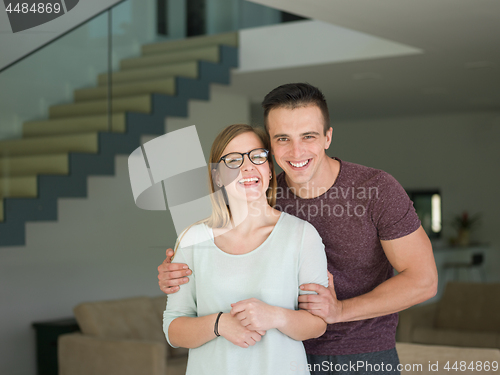 Image of couple hugging in their new home